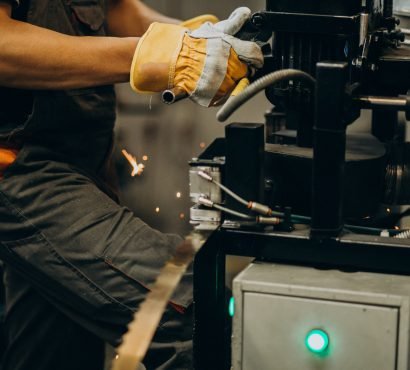 Man working on steel fatory and equipment for steel production